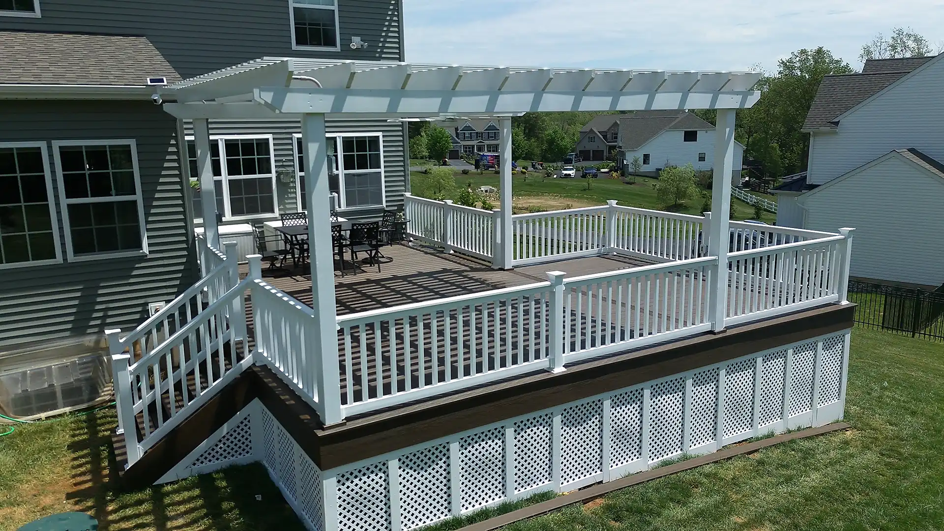 Photo of a covered deck with retractable cover - Covered deck builders and contractors tri-state area pennsylvania