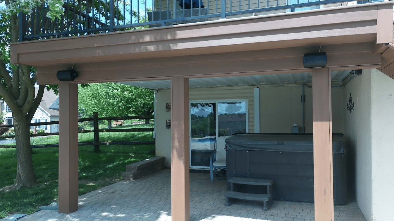 elevated deck with an underdeck drainage system - timbertech decking benefits for homeowners - Composite deck builders in tri state area