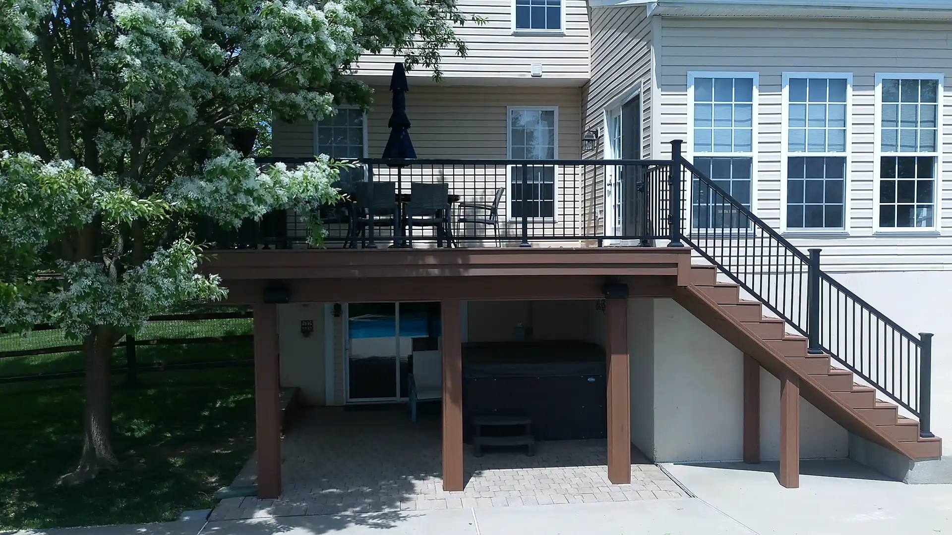 photo of an elevated deck with black metal deck railing - Deck railing System - Deck Railings Installation Services in pennsylvania