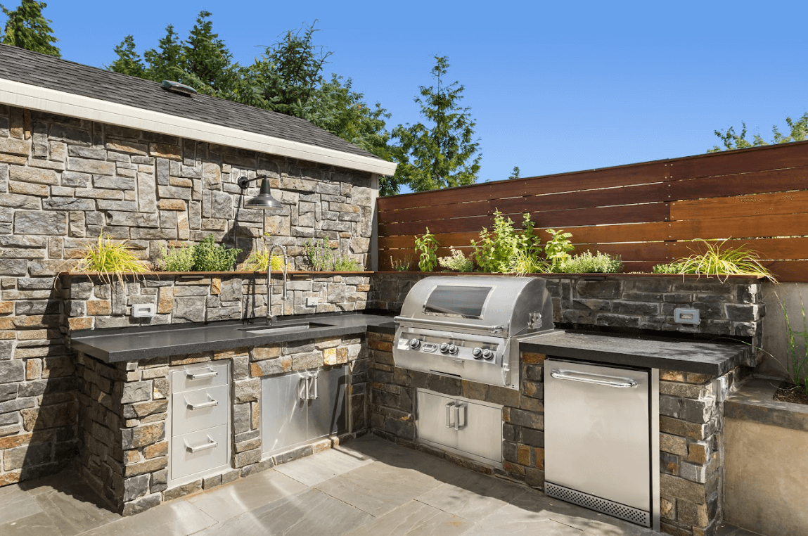 photo of an outdoor kitchen with cabinetry - Outdoor Kitchen Contractor near me PA