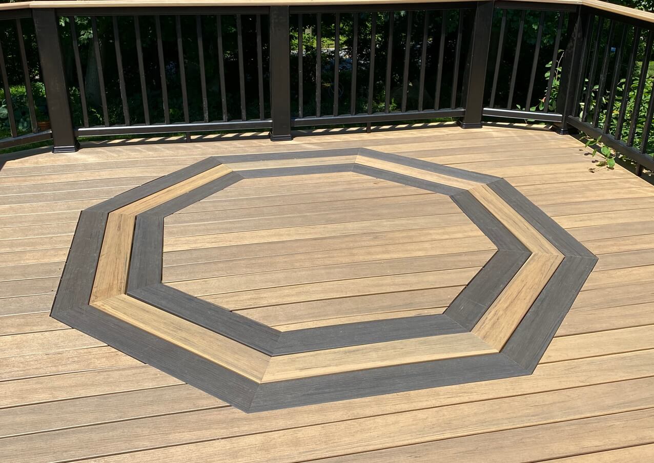 custom deck with an octagonal deck inlay - Composite deck inlays design near me - Outdoor living features contractors